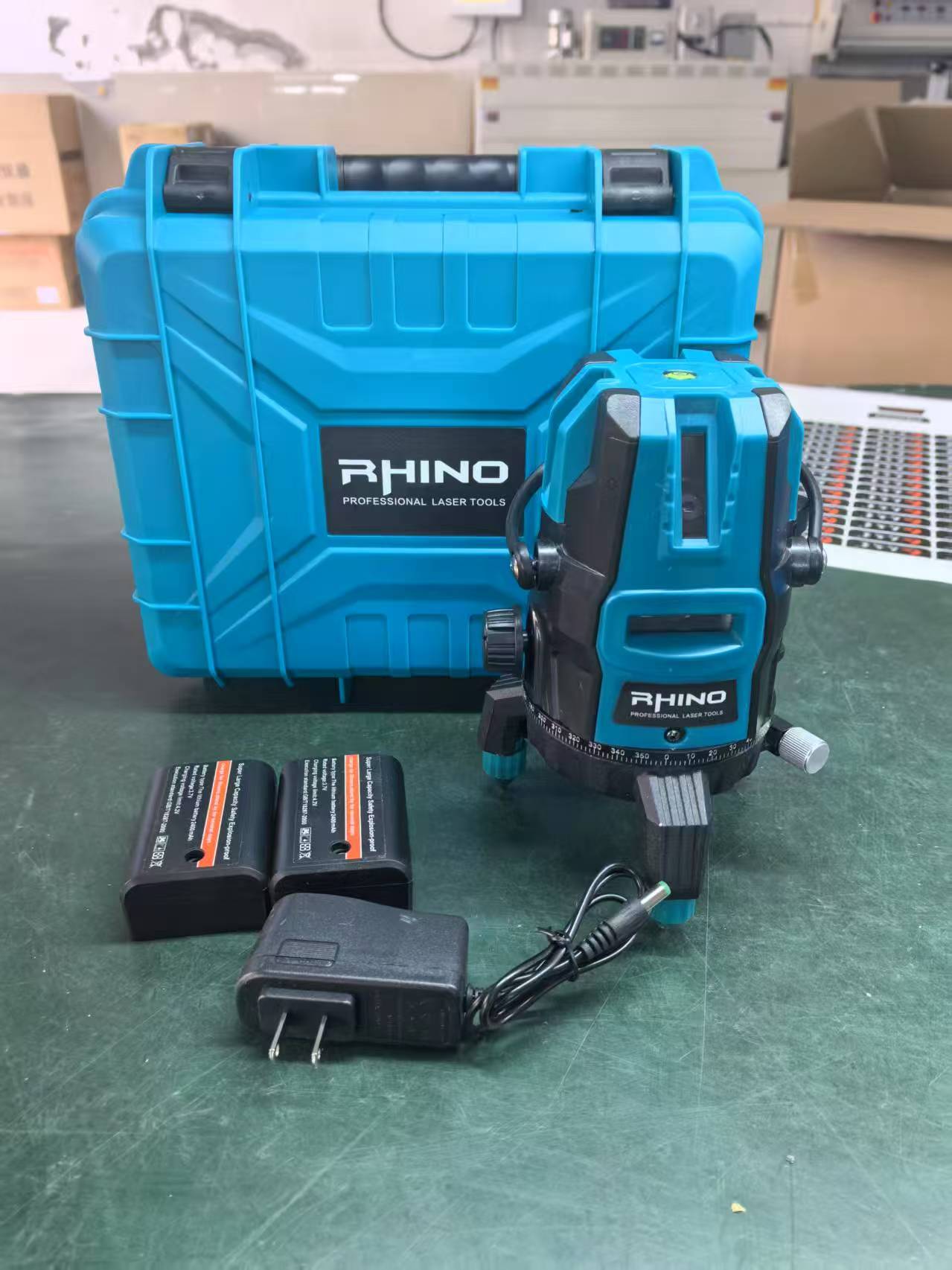 Máy laser 5 tia xanh RHINO DÀI siêu sáng RH-005 Hộp nhựa xanh_10C/T